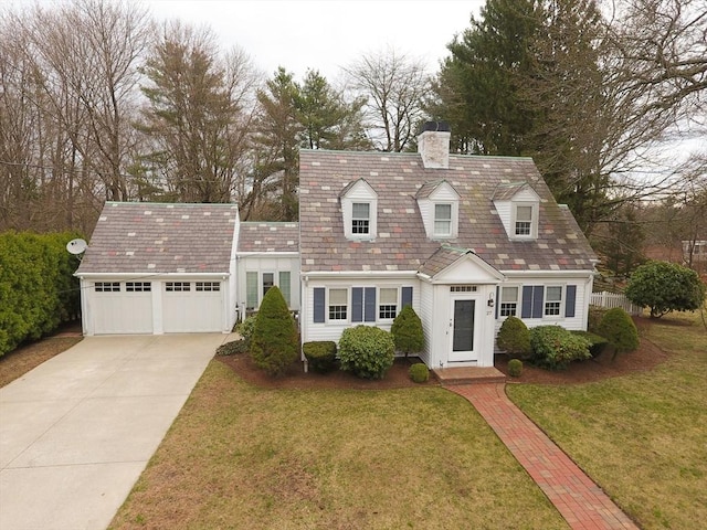 27 Carrlyn Rd, Brockton, MA 02301 - cape cod house with an attached garage, a chimney, concrete driveway, and a front yard