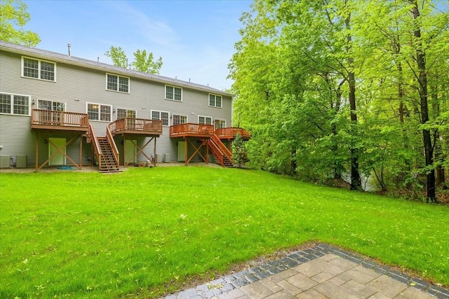 63 Shrine Ave Unit 1, West Boylston, MA 01583 - back of house with stairs, a deck, and a yard