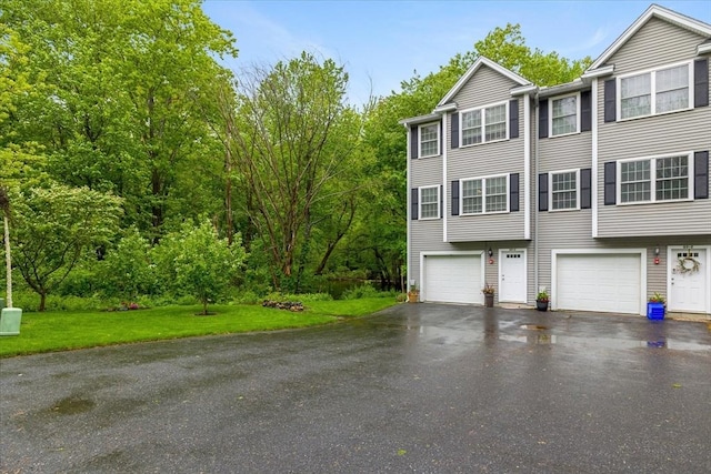63 Shrine Ave Unit 1, West Boylston, MA 01583 - multi unit property featuring asphalt driveway and an attached garage