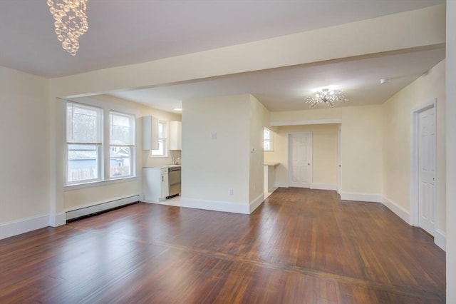 unfurnished living room with dark wood-style floors, a baseboard radiator, and baseboards