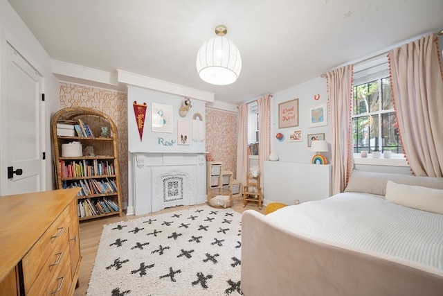 bedroom with light wood-type flooring