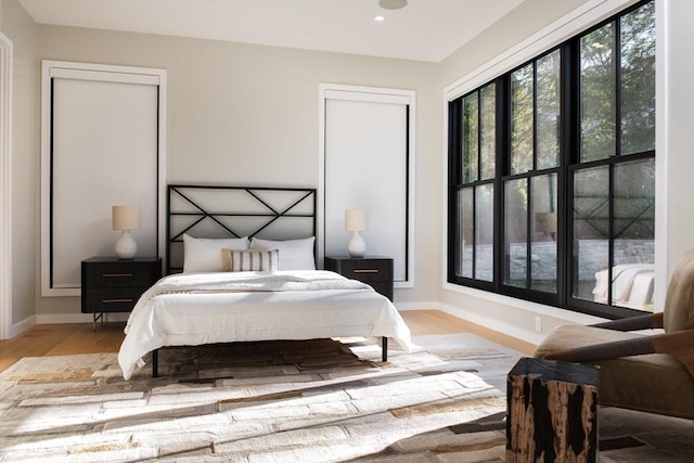 bedroom with light wood-type flooring