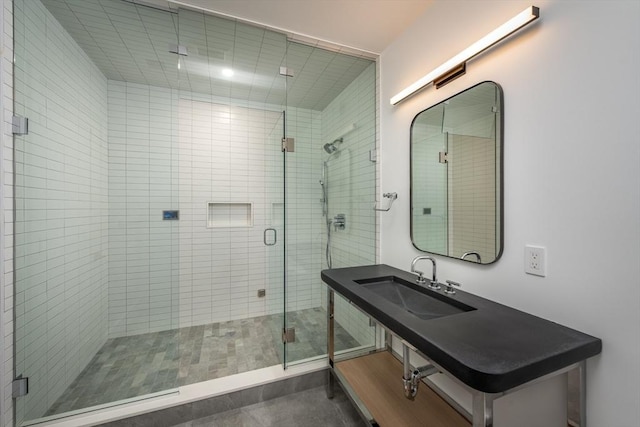 bathroom with sink and walk in shower