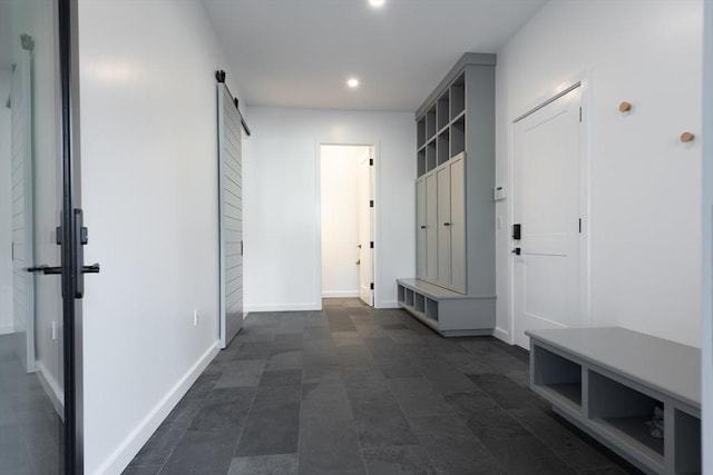 mudroom with a barn door