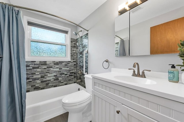 21 Gile St, Haverhill, MA 01830 - bathroom featuring vanity, shower / bathtub combination with curtain, toilet, and wood finished floors