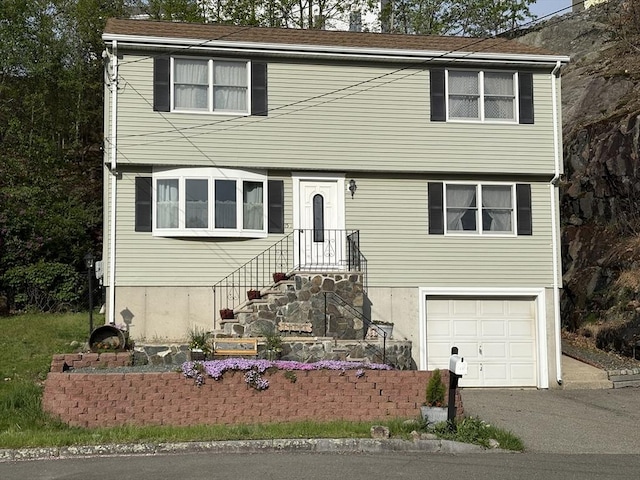 15 Ashlee Gln, Lynn, MA 01904 - colonial house featuring an attached garage and driveway