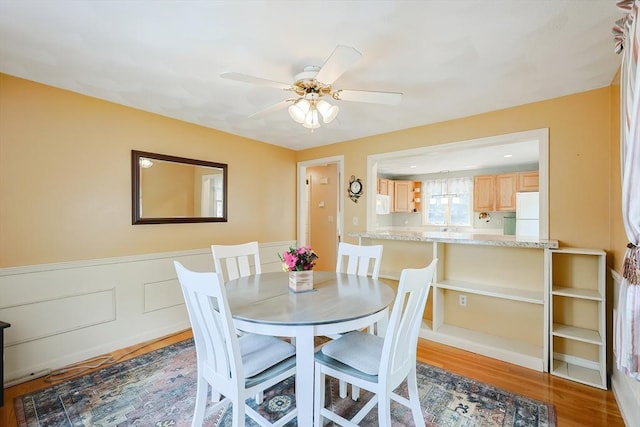 15 Ashlee Gln, Lynn, MA 01904 - dining area with a ceiling fan, wood finished floors, and wainscoting