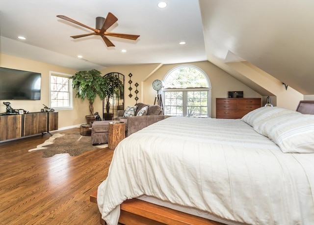 bedroom with recessed lighting, baseboards, wood finished floors, and vaulted ceiling