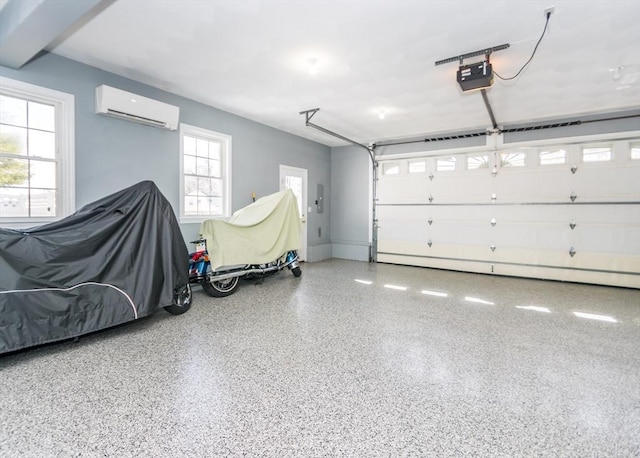 garage with a garage door opener and a wall unit AC