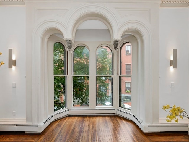 details featuring crown molding and hardwood / wood-style flooring