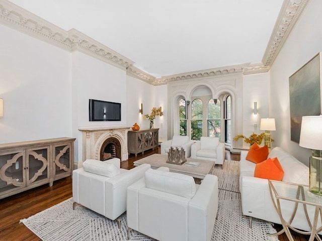 living room with wood-type flooring and crown molding