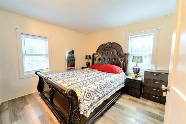 bedroom featuring light wood-style floors