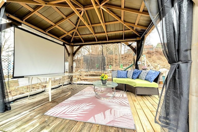 deck with a gazebo and a trampoline