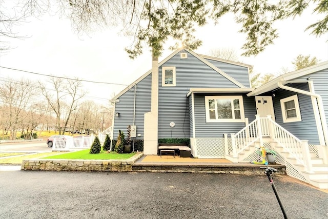 view of front of house featuring a patio area