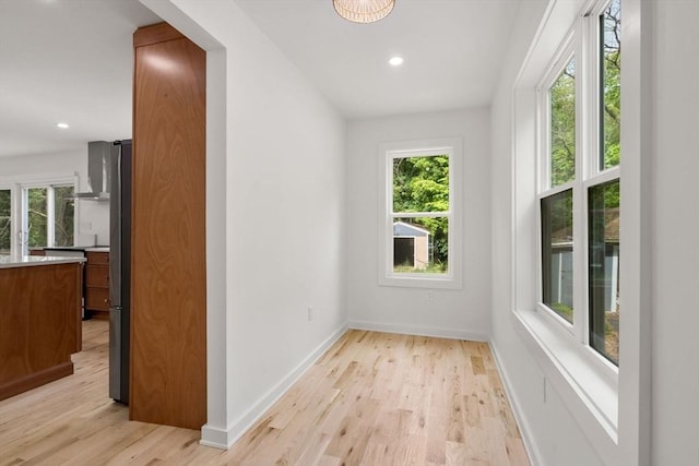 174 Gilbert St, Mansfield, MA 02048 - empty room with light wood-style flooring and recessed lighting