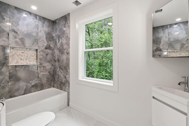 174 Gilbert St, Mansfield, MA 02048 - bathroom with vanity, marble finish floors, shower / bathtub combination, and recessed lighting