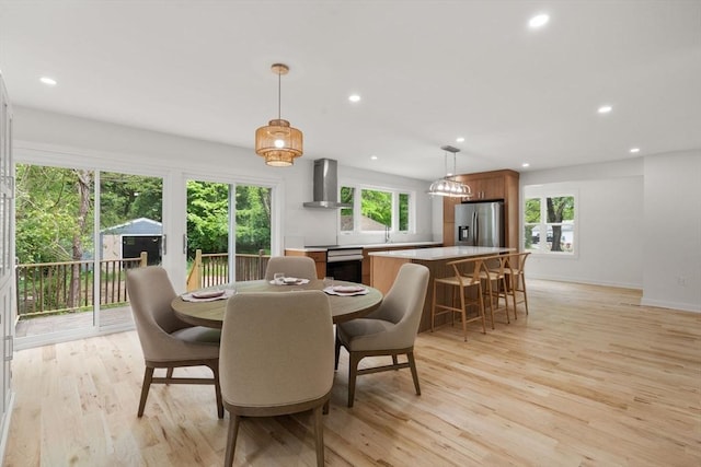 174 Gilbert St, Mansfield, MA 02048 - dining room featuring light wood finished floors and recessed lighting