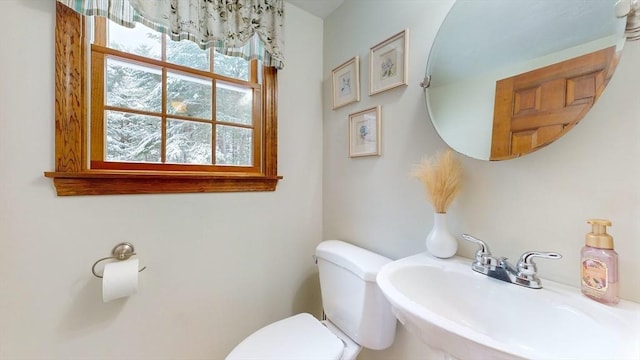 bathroom with sink and toilet