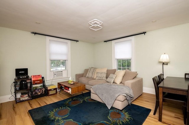 35 Locust St Unit 3, Danvers, MA 01923 - living room featuring light wood-style flooring and cooling unit