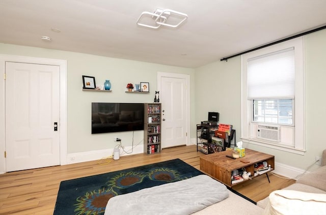 35 Locust St Unit 3, Danvers, MA 01923 - living area featuring wood finished floors and cooling unit