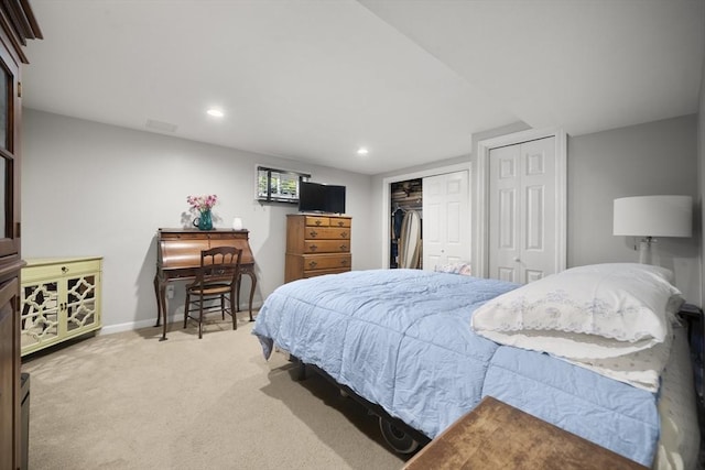 56 Country Way, Whitman, MA 02382 - bedroom featuring light colored carpet, multiple closets, baseboards, and recessed lighting