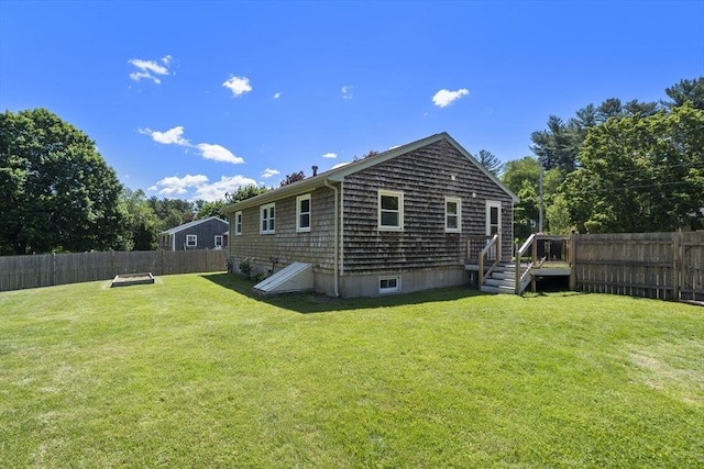56 Country Way, Whitman, MA 02382 - rear view of house with a deck