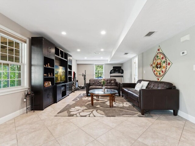 231 Gulf St, Shrewsbury, MA 01545 - living room featuring healthy amount of natural light, baseboards, recessed lighting, and light tile patterned flooring