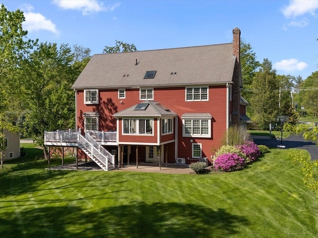 231 Gulf St, Shrewsbury, MA 01545 - back of house featuring a patio, stairway, a chimney, a deck, and a lawn