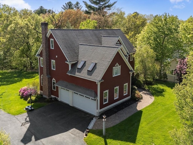 231 Gulf St, Shrewsbury, MA 01545 - view of front of property featuring an attached garage, a chimney, driveway, a front yard, and roof with shingles