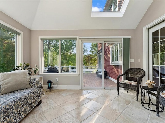 231 Gulf St, Shrewsbury, MA 01545 - sunroom with lofted ceiling, baseboards, and a skylight