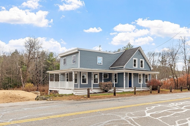 farmhouse-style home with covered porch