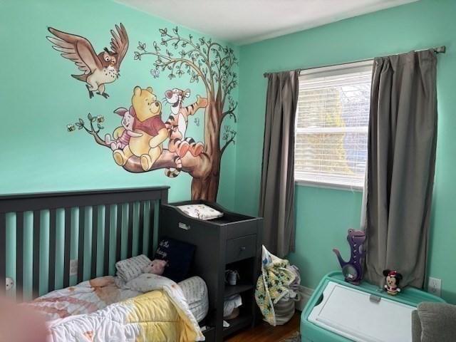 bedroom featuring hardwood / wood-style floors