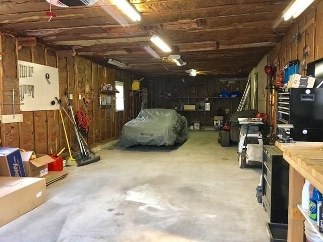 garage with a workshop area