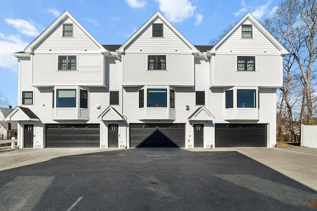 view of front of property with a garage and driveway