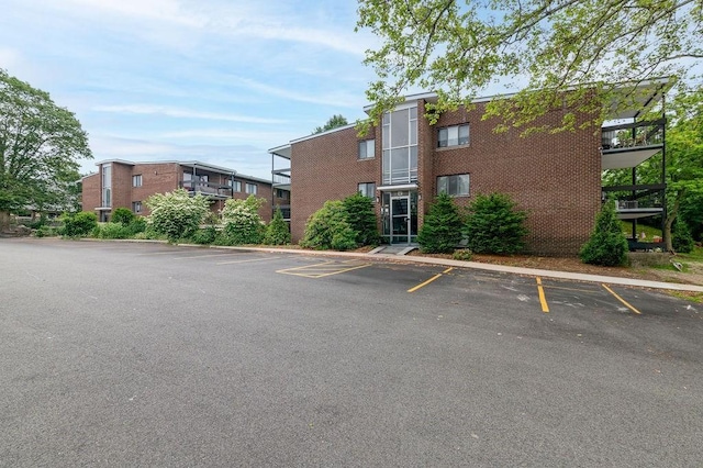 150 Elm St Unit 1, Braintree, MA 02184 - view of building exterior with uncovered parking