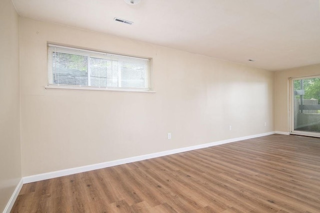 150 Elm St Unit 1, Braintree, MA 02184 - spare room with wood finished floors and baseboards