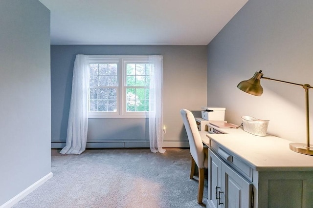 home office featuring light colored carpet and baseboards