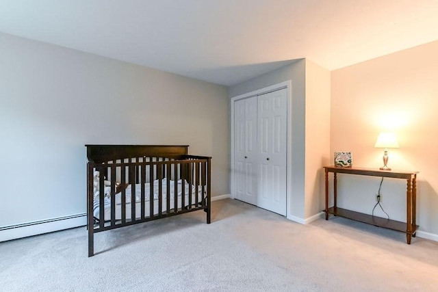 bedroom featuring carpet floors, a closet, and baseboards