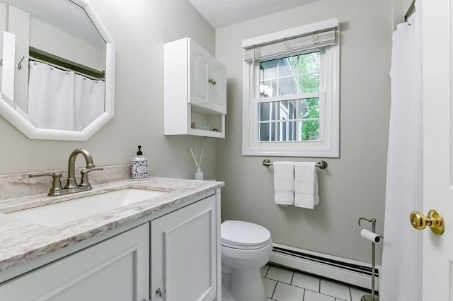 full bath with a baseboard heating unit, tile patterned flooring, toilet, and vanity