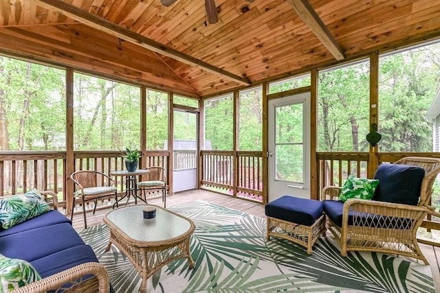 sunroom with a ceiling fan