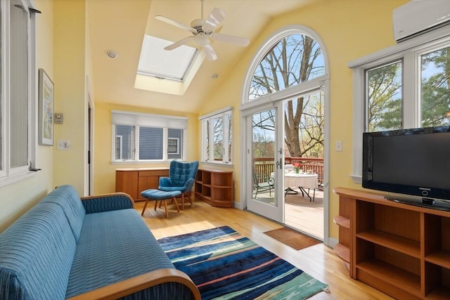sunroom with a skylight and an AC wall unit