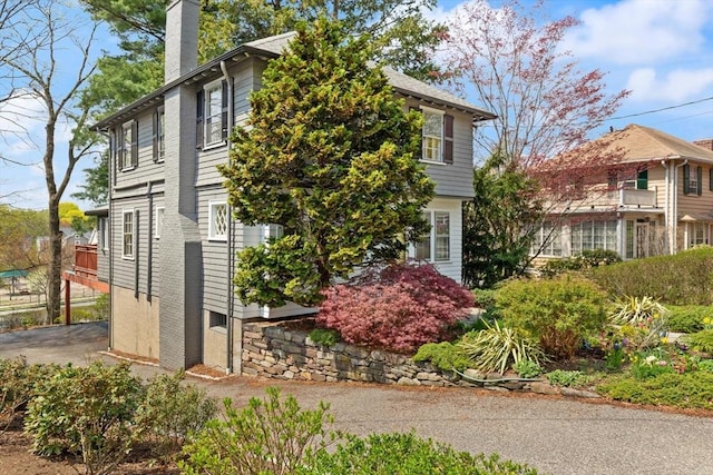 view of front of home with a chimney