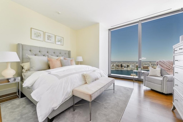 1 Dalton St Unit 5102, Boston, MA 02115 - bedroom with wood finished floors and expansive windows