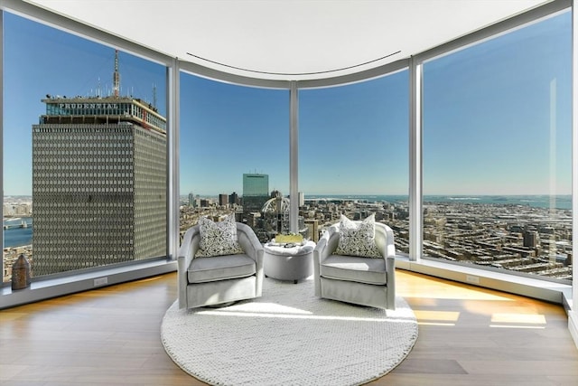 1 Dalton St Unit 5102, Boston, MA 02115 - living area featuring expansive windows, wood finished floors, and plenty of natural light