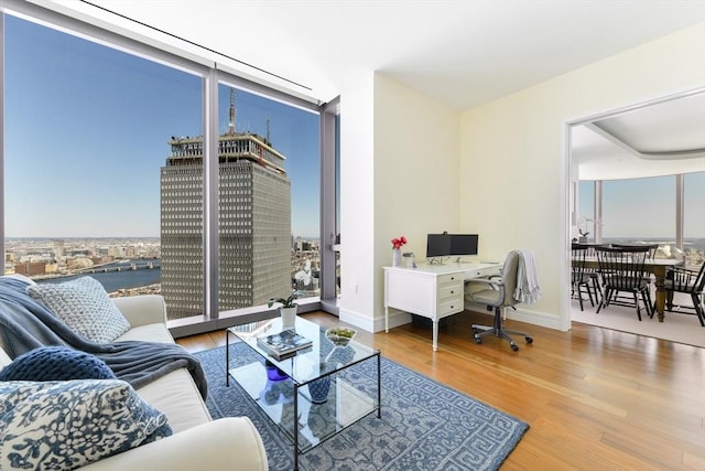 1 Dalton St Unit 5102, Boston, MA 02115 - living room featuring wood finished floors and an office area