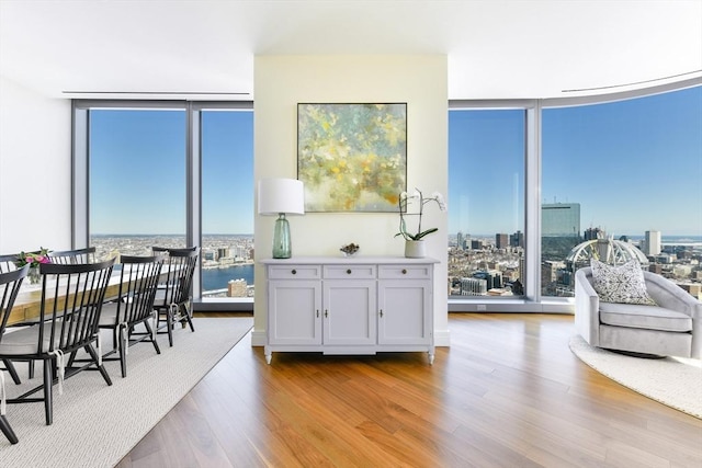 1 Dalton St Unit 5102, Boston, MA 02115 - dining area with floor to ceiling windows, wood finished floors, and a view of city