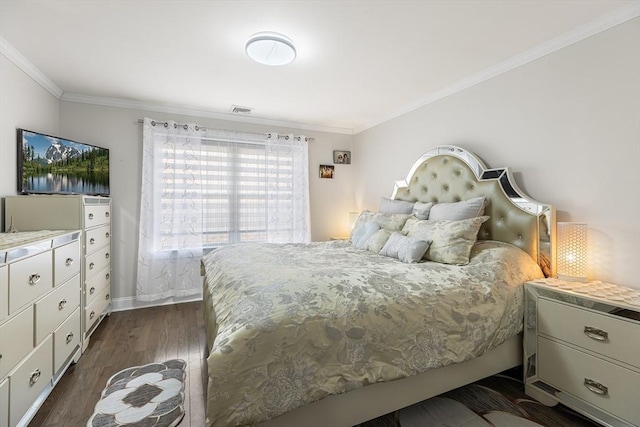 bedroom with crown molding, dark wood-style floors, visible vents, and baseboards