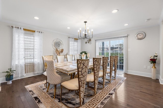 dining room featuring a chandelier, crown molding, and hardwood / wood-style flooring