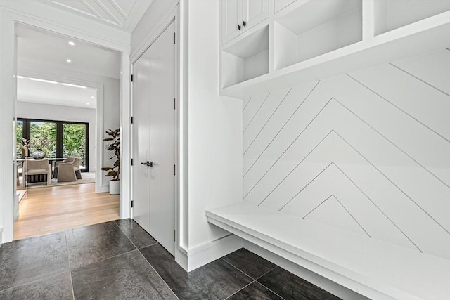 mudroom featuring dark wood-type flooring