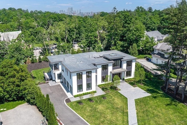 birds eye view of property with a city view